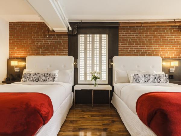 Hôtel des Coutellier : photo 1 de la chambre suite avec 2 lits doubles