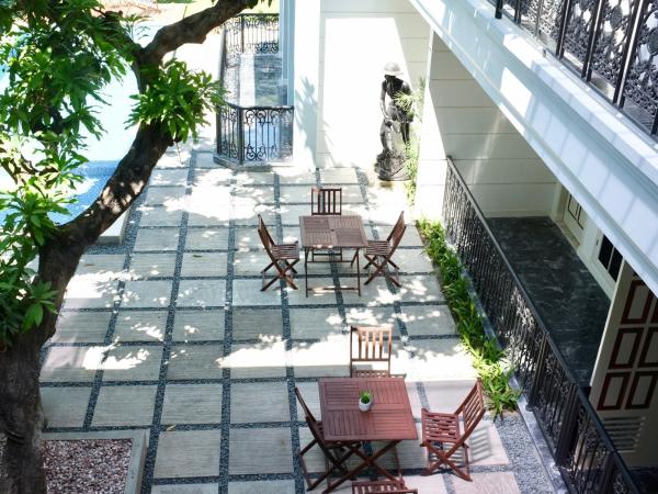Rumah Kertajaya : photo 2 de la chambre chambre lit queen-size - vue sur jardin