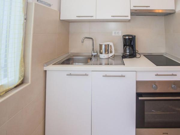 App. Fiorela : photo 9 de la chambre appartement - rez-de-chaussée