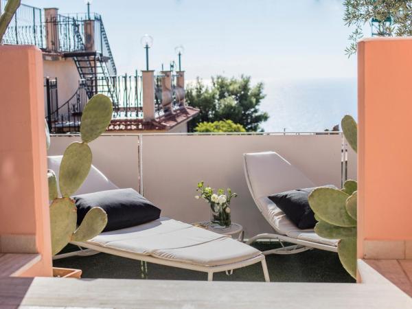 La Malandrina - Apartments & Suites : photo 4 de la chambre appartement 1 chambre avec vue sur la mer - bâtiment séparé