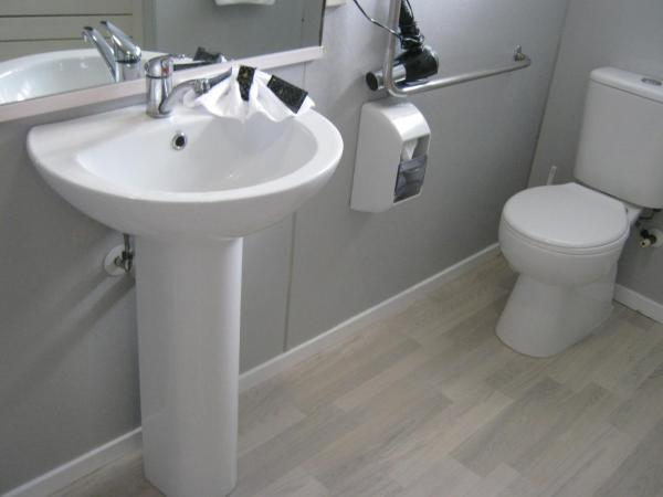 Palm Court Motor Inn : photo 5 de la chambre studio avec bain à remous