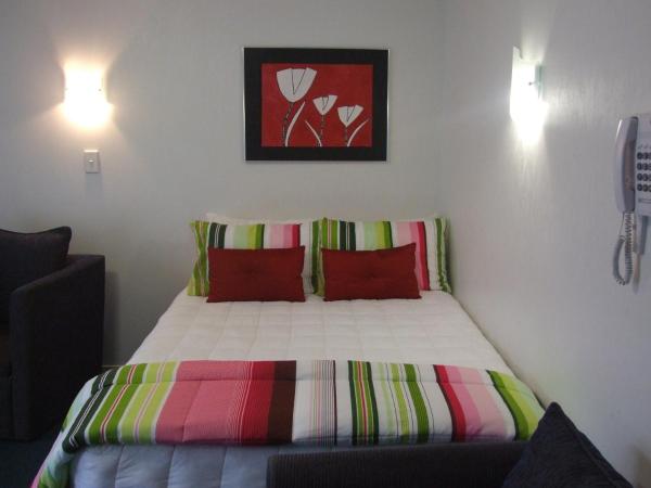 Palm Court Motor Inn : photo 1 de la chambre appartement 1 chambre avec jacuzzi