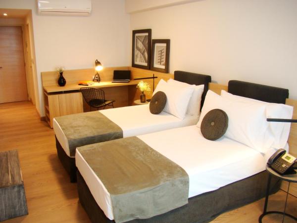 Dazzler by Wyndham Rosario : photo 10 de la chambre twin room with two twin beds - mobility access - non-smoking - garden view