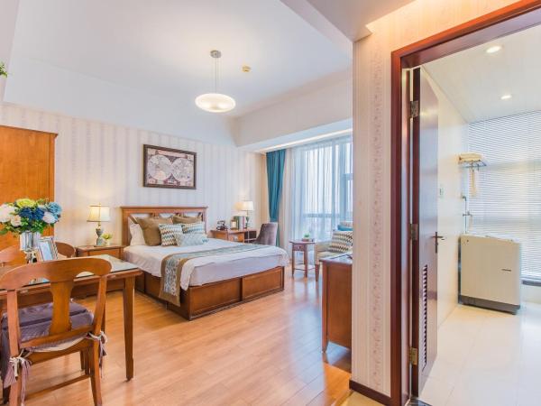 Westlake Service Apartment : photo 2 de la chambre chambre lit queen-size