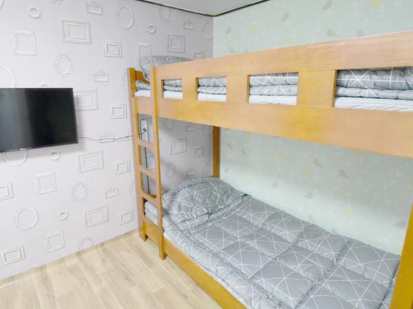 Photo Park Guesthouse : photo 9 de la chambre chambre lits jumeaux avec salle de bains privative