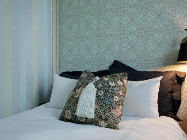 Central Tourist Hotel : photo 5 de la chambre chambre double deluxe