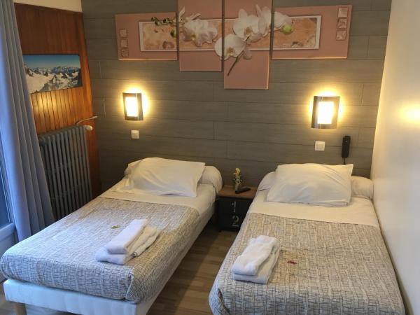 Hotel La Chaumiere : photo 1 de la chambre chambre lits jumeaux