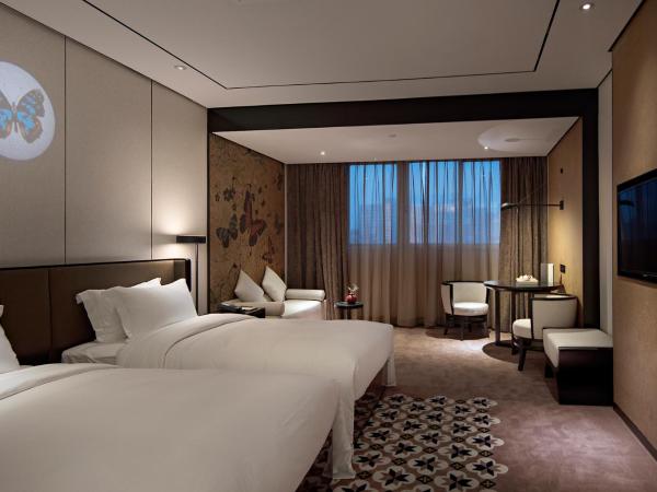 Paco Hotel Dongpu Guanghzou -Free Shuttle Bus for Canton Fair : photo 7 de la chambre chambre lits jumeaux exécutive