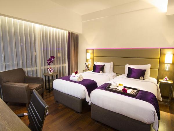 Satoria Hotel Yogyakarta - CHSE Certified : photo 4 de la chambre chambre lits jumeaux supérieure