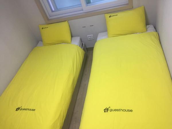 24 Guesthouse KyungHee University : photo 2 de la chambre chambre lits jumeaux