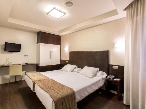 Hotel Alda San Carlos : photo 2 de la chambre chambre double ou lits jumeaux