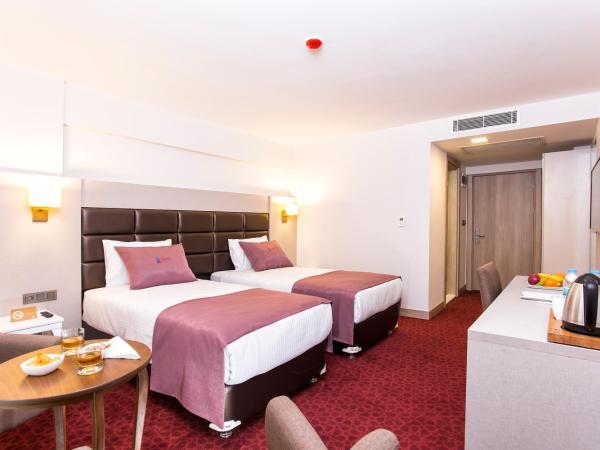 Perla Arya Hotel : photo 2 de la chambre chambre lits jumeaux standard