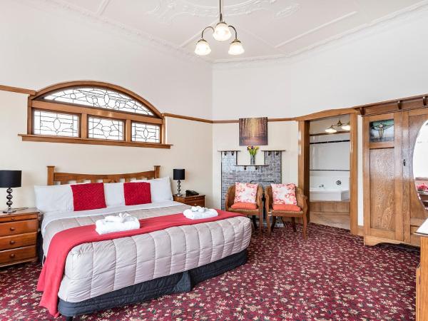 Halswell Lodge : photo 5 de la chambre chambre lit king-size avec baignoire spa - lodge