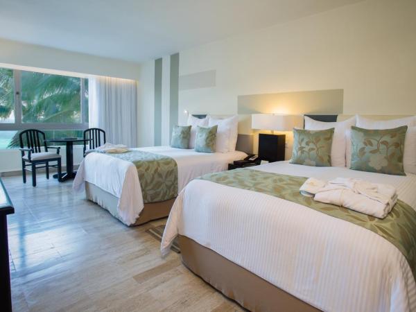 Dreams Sands Cancun Resort & Spa : photo 6 de la chambre chambre de luxe avec vue partielle sur l'océan