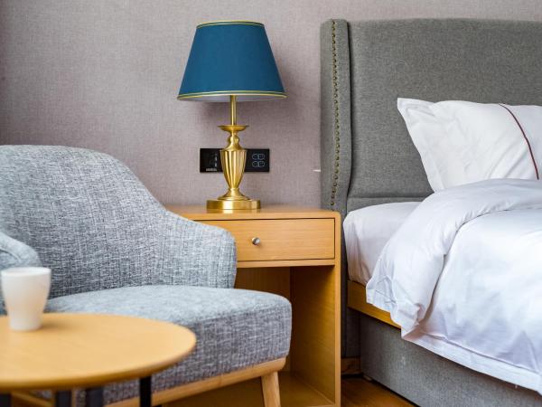 Guangzhou Mustin Hotel : photo 6 de la chambre chambre lits jumeaux standard