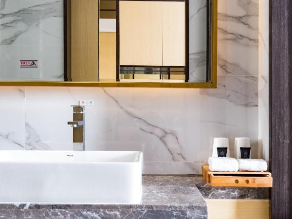 Guangzhou Mustin Hotel : photo 2 de la chambre chambre lits jumeaux deluxe