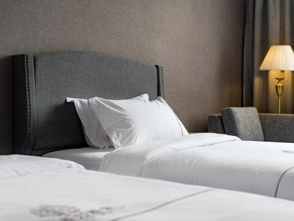 Guangzhou Mustin Hotel : photo 8 de la chambre chambre lits jumeaux deluxe