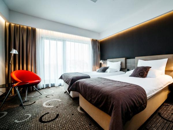 Q Hotel Plus Kraków : photo 2 de la chambre chambre lits jumeaux