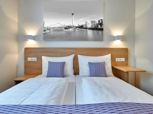 McDreams Hotel Düsseldorf-City : photo 2 de la chambre chambre double confort