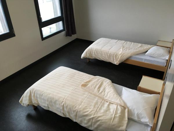 L'Escale : photo 1 de la chambre chambre lits jumeaux pour personnes à mobilité réduite