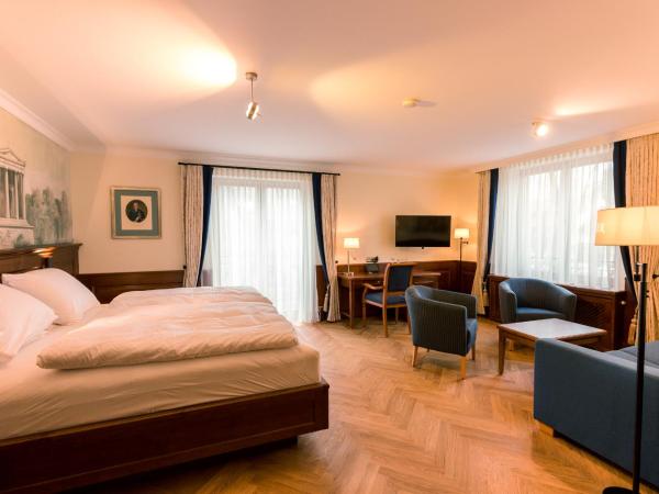Hotel & Gaststätte zum Erdinger Weißbräu : photo 1 de la chambre suite junior