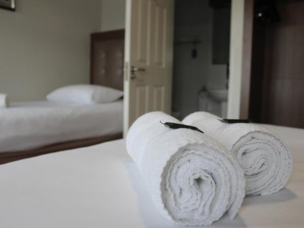 St. Judes Lodge B&B : photo 10 de la chambre chambre triple