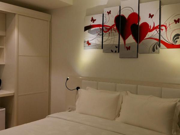 Pine Garden Hotel : photo 1 de la chambre chambre lit queen-size deluxe