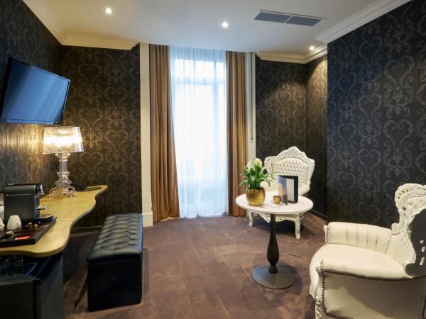 Le Chateau de Namur : photo 3 de la chambre suite lit king-size avec coin salon