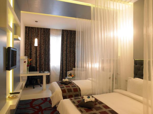 Blu Petal - A Business Hotel : photo 2 de la chambre chambre lits jumeaux