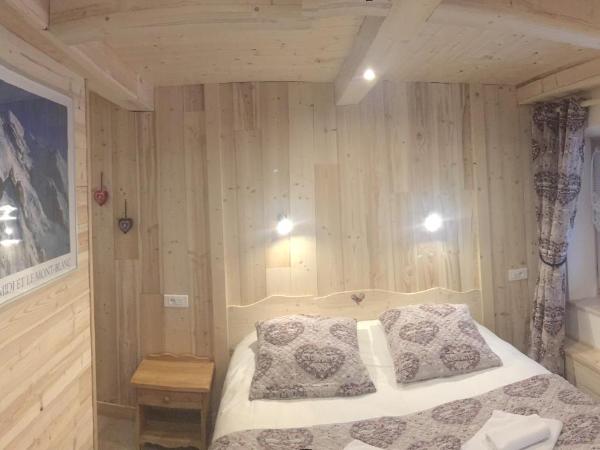 Chalet l'Aiglon : photo 5 de la chambre chambre triple – vue sur montagne