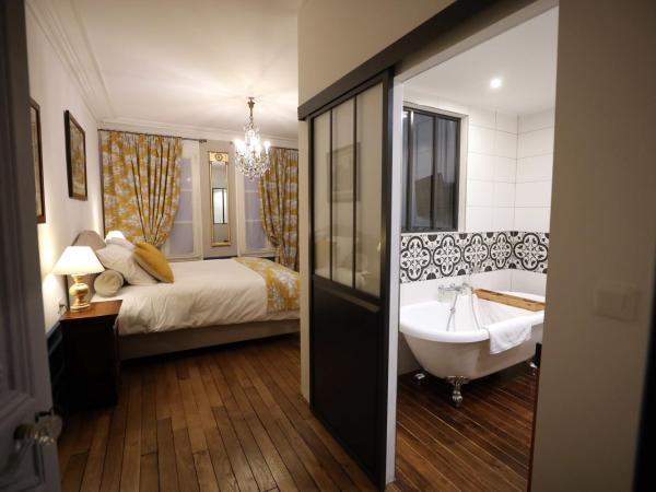 Au Jeu de Paume : photo 5 de la chambre chambre double deluxe avec baignoire