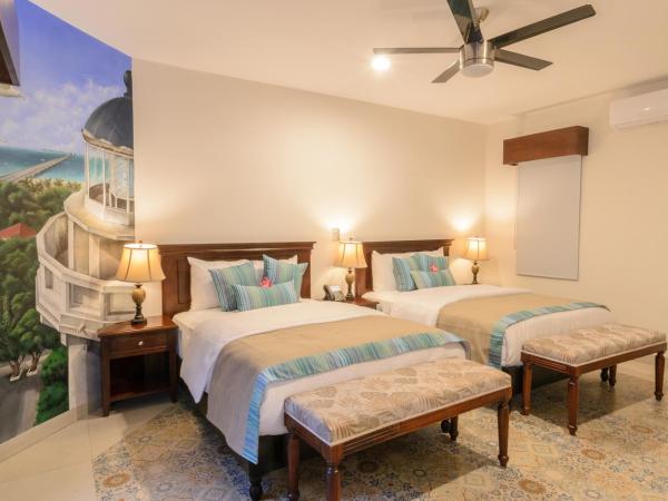 Hotel Boutique Real San Juan Center : photo 1 de la chambre suite familiale