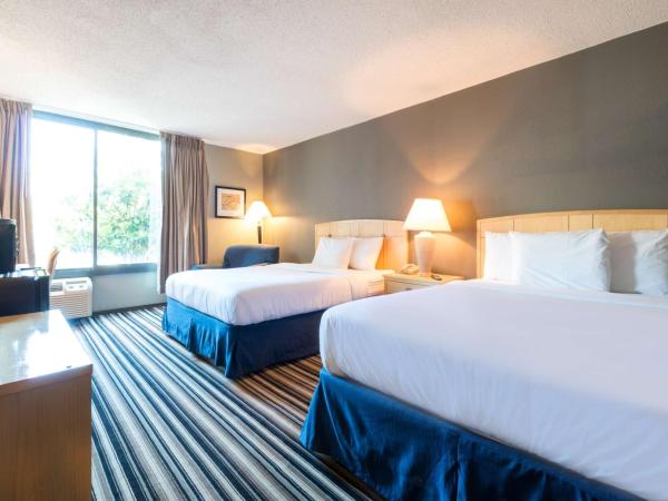 Travelodge by Wyndham Memphis Airport/Graceland : photo 1 de la chambre chambre deluxe avec 2 lits queen-size - non-fumeurs