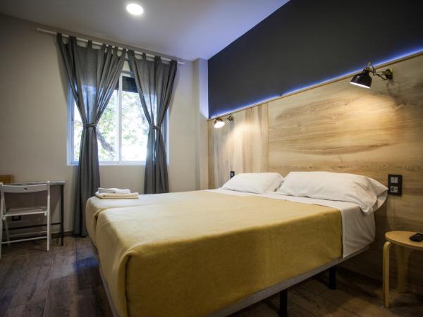 CC Atocha : photo 1 de la chambre chambre lits jumeaux