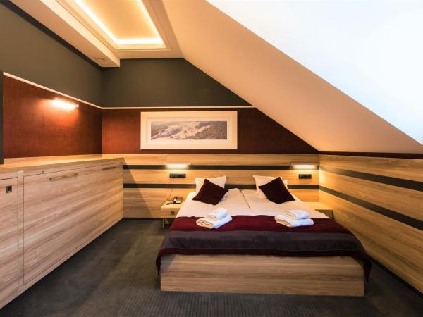 Villa Winterpol : photo 9 de la chambre chambre triple supérieure