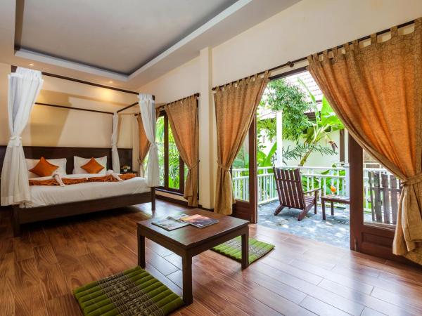 Lanta Klong Nin Beach Resort : photo 1 de la chambre bungalow deluxe - vue sur jardin