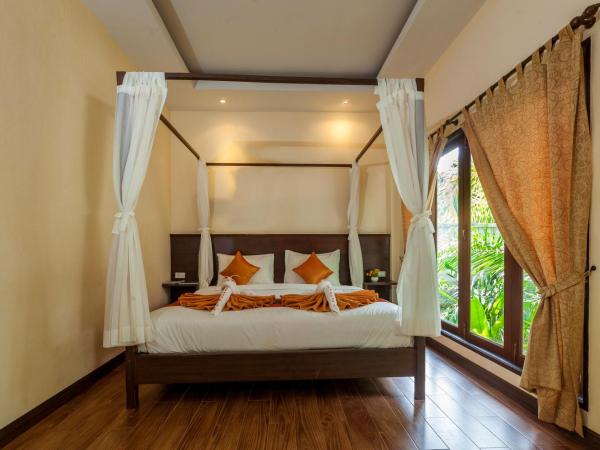 Lanta Klong Nin Beach Resort : photo 2 de la chambre bungalow deluxe - vue sur jardin