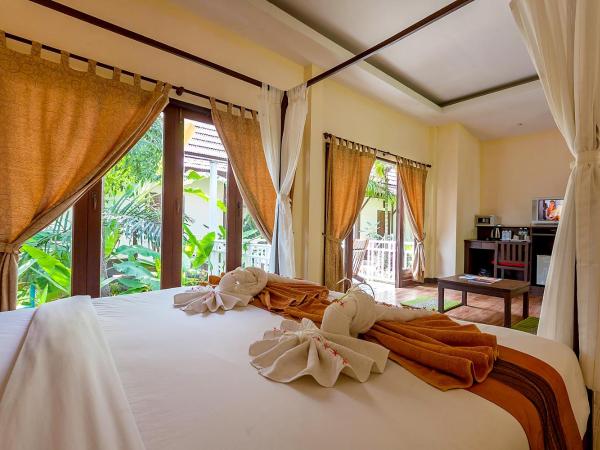 Lanta Klong Nin Beach Resort : photo 3 de la chambre bungalow deluxe - vue sur jardin