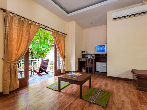 Lanta Klong Nin Beach Resort : photo 7 de la chambre bungalow deluxe - vue sur jardin