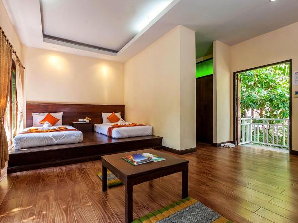 Lanta Klong Nin Beach Resort : photo 6 de la chambre bungalow deluxe - vue sur jardin