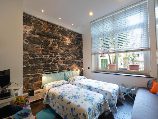 B&B dell'Acquario : photo 1 de la chambre chambre double ou lits jumeaux - vico cimella 6r