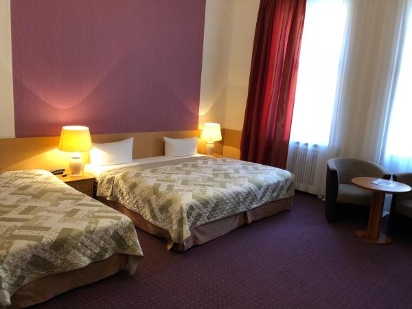 Hotel Castell am Kurfürstendamm : photo 3 de la chambre chambre triple