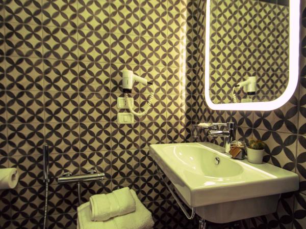 Arsenale Suites : photo 7 de la chambre chambre de luxe avec jardin privé