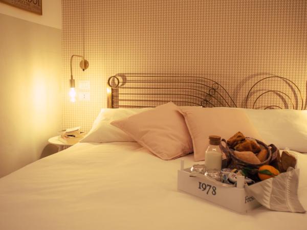 Arsenale Suites : photo 4 de la chambre chambre de luxe avec jardin privé