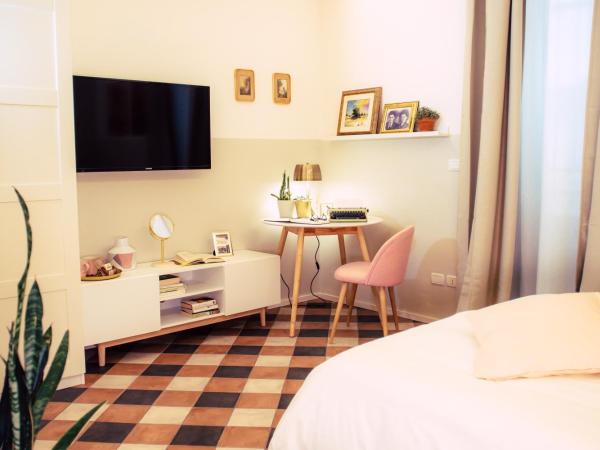 Arsenale Suites : photo 2 de la chambre chambre de luxe avec jardin privé