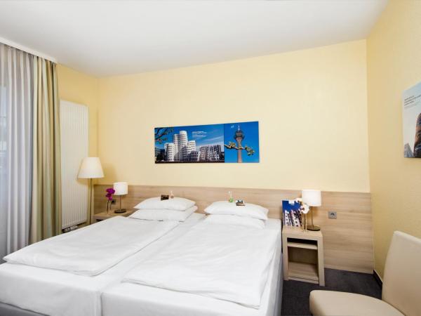 Hotel am Hofgarten : photo 1 de la chambre chambre double