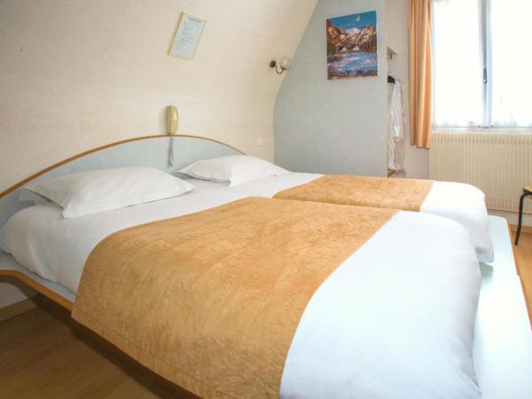Hotel De Rosny : photo 1 de la chambre chambre lits jumeaux