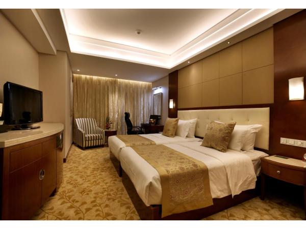 Citic Ningbo International Hotel : photo 2 de la chambre chambre double ou lits jumeaux exécutive deluxe