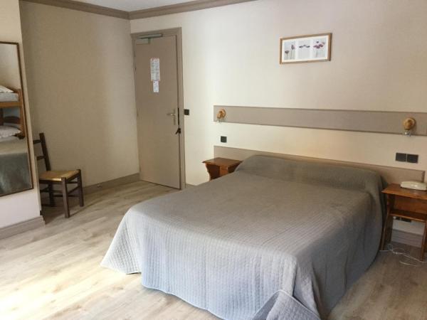 Hotel Le Centre : photo 1 de la chambre chambre triple
