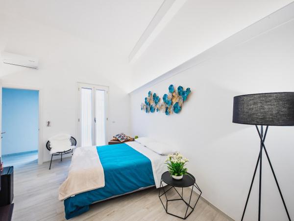 La casa di Giovanni : photo 2 de la chambre chambre double ou lits jumeaux avec patio